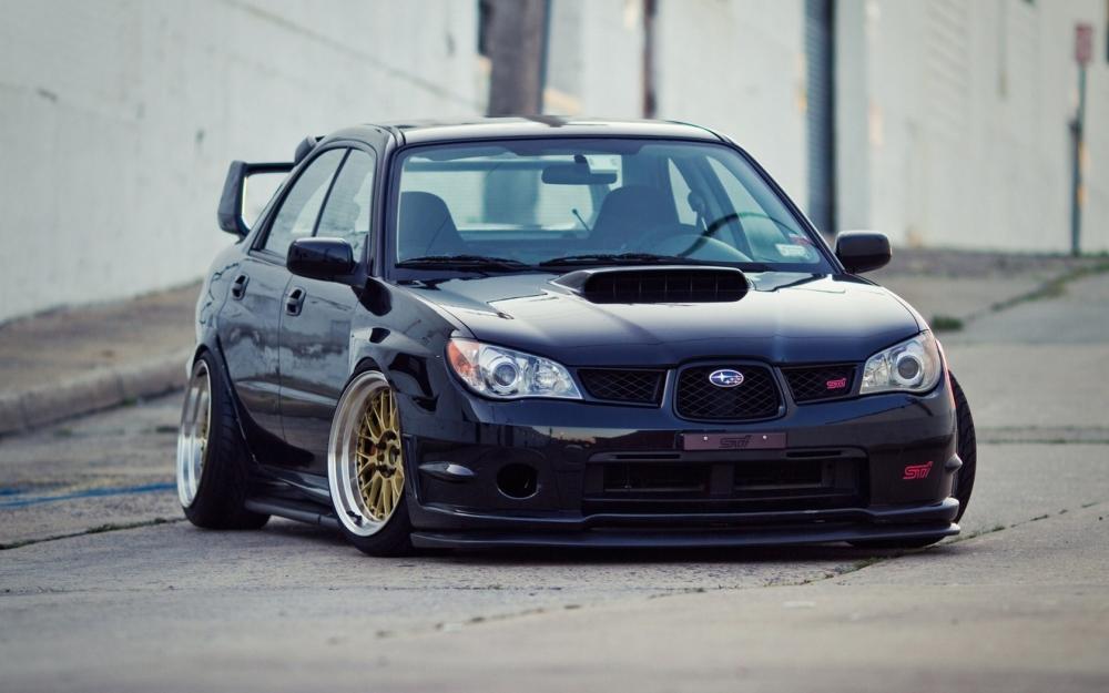 subaru-impreza-sti-wheels-tuning-car-1680x1050.jpg